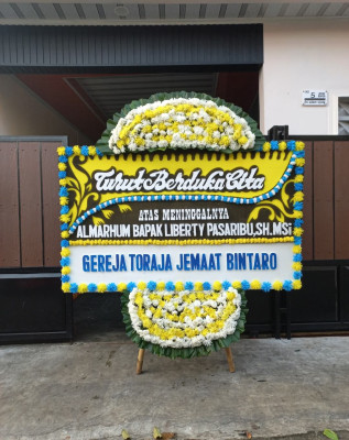 Papan Bunga Duka di Biak Kota